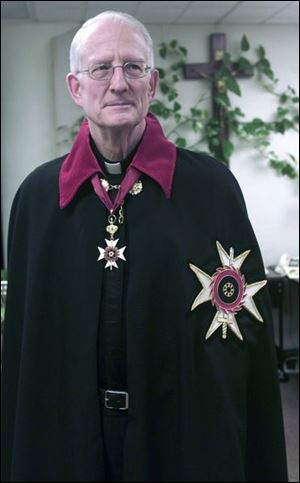The Rev. John McClure in Knights of St. Catherine of Sinai cape and medallion.