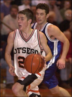 Otsego guard Pete Ferdig pushes the ball up the court against Anthony Wayne. Ferdig scored 14 points in his first varsity start.