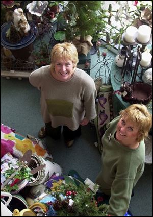 Sandy Sack, left, and Sue Roberts have had sales increase s at their shop from $200,000 to $500,000 a year since 1994.