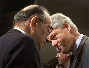 Federal Reserve Chairman Alan Greenspan helped the President to change the nation's basic economic outlook.