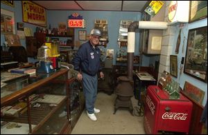 Mr. Wolfe keeps his collection of Sohio memorabilia on display in a replica of an old-time gas station, which he built himself just yards from his home in Eden Township. `If you need money, don't come here. Anything else, we might have,' he jokes.