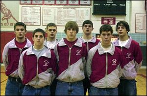 Bedford High School had seven wrestlers capture places in the Michigan individual high school championships, front row from left: Dan Davis, Brad Grosteffon, Greg Brescol; second row, from left: Josiah Boyer, Troy Lusky, Clint Salisbury, and Justin Zink.