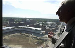 Hometown boy Jamie Farr gets a view of what the rest of Toledoans will be seeing soon: the new downtown Mud Hens stadium.