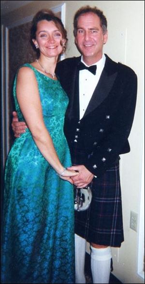 Ottawa Hills native and kilt-clad Robert Rand: shown here with his fiancee, Laura Watson.