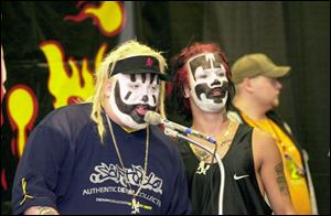 Violent J, left, and Shaggy 2 Dope answer questions. About 7,000 fans, or Juggalos, are here for a three-day convention.