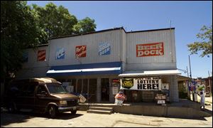 The Beer Dock, at Huron and Lagrange streets, is one of the vanishing breed of family-owned carryout markets.