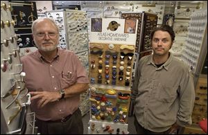 ‘I would like to be part of that downtown revitalization, and I guess I feel strongly about it,' says Harry Roby, left, owner of Hardware Unlimited, with his son, Ben, in their Secor Road store. ‘I believe in the future of the downtown.'