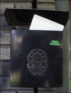 A mailbox at 2653 Norman St. in Detroit displays the name of Nabil Almarabh, who is is considered a link to the bin Laden group.
