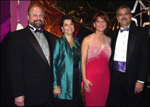 BENEFIT: Tom Merritt, Debbie Merritt, Lynne Mezinko, and Vince Mezinko had a 'Night to Rember' at the hospital event.