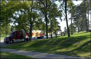 Eighteen miles west of Toledo is a rest area with pit toilets, no sidewalk, and no parking lot.