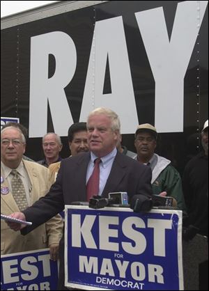 Ray Kest rallies with his supporters at his campaign headquarters off Heatherdowns Boulevard.