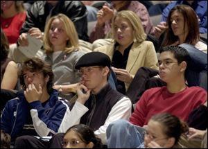 Maumee Valley Country Day School students listen to a speech about how to prevent terrorism during Issue Day.
 