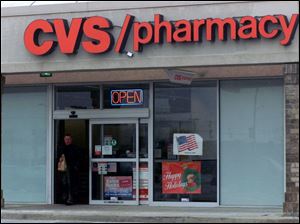 This CVS store at 5860 Lewis Ave. is one of four in the Toledo area that will be bought and renamed by the Rite Aid chain.
