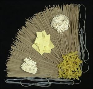 Types of noodles include soba (background), traditional egg (lower right covner), and clockwise from left, Asian bean, Hungarian, and Asian wheat.