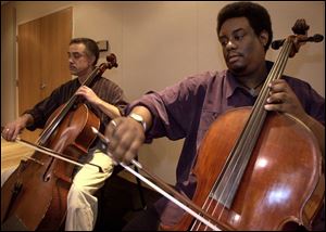 After `Lincoln,' Robert Clemens, left, and Damon Coleman will play a Vivaldi concerto.