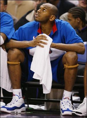 Detroit Pistons' Jerry Stackhouse watches from the bench during the first-half of NBA first round playoff action against the Toronto Raptors.