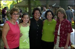 FAREWELL: Sue Hague-Rogers, Torri Knight (daughter of Nancy Lopez), LPGA pro Nancy Lopez, Rita Mansour, and Kim Bauer at a party for Ms. Lopez.