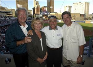 BASEBALL BREAK: Actor Ron Masak, Pam Hill, Jamie Farr, and Mike Hill take a break from the LPGA in the Pepsi suite at Fifth Third Field.