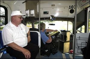 Leo Darmofal makes use of TARTA's Perrysburg Call-A-Ride bus, which is being driven by Betty Armes.