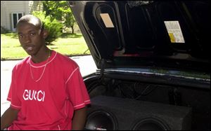 John Walker, 18, of Toledo has two 12-inch subwoofers in the trunk and a 500-watt amplifier but he says he only plays it loud during the daytime because he wants to keep it 'respectable.'