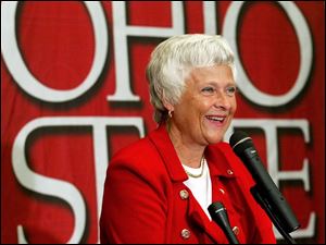 Dr. Karen Holbrook speaks to the media during a news conference.