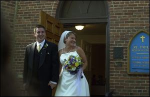 AT THE CHURCH: Robert Franz and Gretchen LeBoutillier were wed in St. Paul's Episcopal Church in Maumee, where the bride's parents were married 36 years ago.