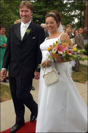 PERRYSBURG WEDDING: Brian Visser and Julie Gilley married in Zoar Lutheran Church.