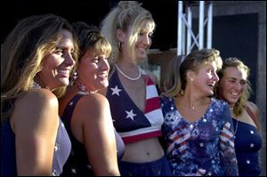 The patriotic theme captured the fancy of five women outside the Fox Theatre. Showing heir colors are, from left, Denise Marusak, Missy Misko, Mary Beth Bodrie, Margie Gape, and Michelle Perry-Pandoff, all from Grosse Ile, Mich.