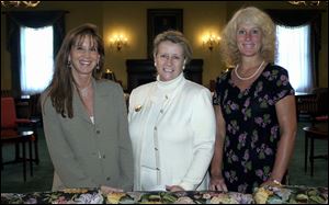 MAKING PLANS: Sharon Speyer, left, Ann Sanford, and Darlene Minnick attended the Sapphire Ball kickoff at Inverness Club.