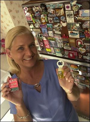 Debbie Pratt began collecting refrigerator magnets in the 1980s.