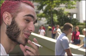 University of Toledo freshman Bob Uhoda foresees a benefit when an in-dorm smoking ban affects him next year. He is a resident of Parks Tower.
