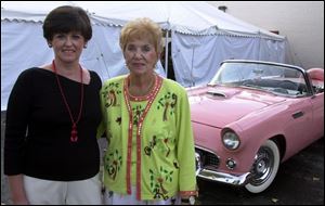 HOT WHEELS: President Lynda Gilbert and Chairwoman Sue Lovett considered a test drive at the lobster party.