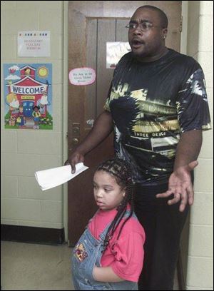 Christopher Love, with his daughter, Khari, 4, criticizes the study for the negative effects it could have on a child.