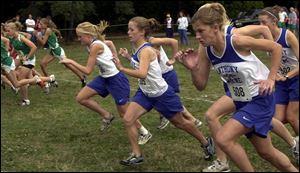 Anthony Wayne's runners get off to a determined start yesterday at Pearson Park.