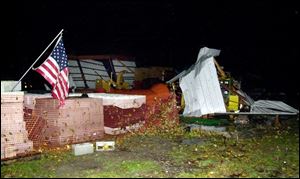 Little remains of a storage building in the village of Jerry City after a suspected tornado swept through the area.
