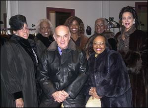 RAFFLE: Modeling furs for a fund-raiser are, from left, Druscilla G. Griffin, Tracci Harmon, Edrene Cole, front, Equilla G. Roach, and Denise Black-Poon. Roth Furs owner Philip Roth is in front. 
