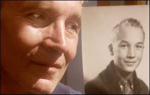 George Keller, 53, of Bellevue, with a photo of himself at 12, tells of visiting a priest's cottage that had a pond, a go-cart track, and a boat.
