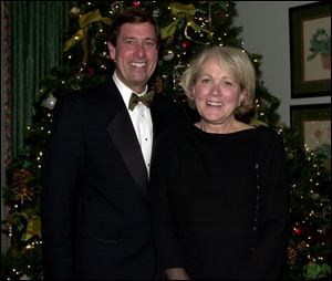 WINTER DANCE: Tom and Gretchen Downs attend 'The Holiday Snow Ball' at the Belmonth Country Club.