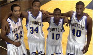 From left, Cowboys Ronnell Isom, Ernie Reed, Jerome Pierce and David Osby share the scoring load with averages of 14.1, 11.9, 11.2 and 11.4, respectively.