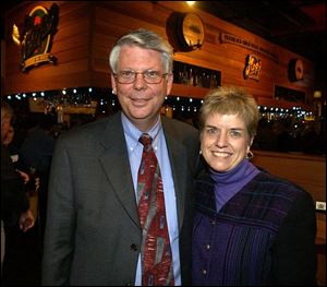 GOLFING PARTIES: Jim and Marge Sander are gala chairmen for two Epilepsy Center events.