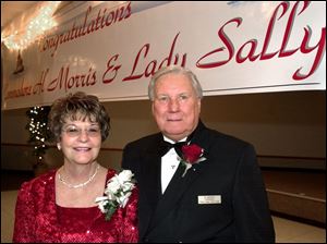 THEIR SIGN: Sally and Al Morris, new commodore of the Riverview Yacht Club, are honorees.