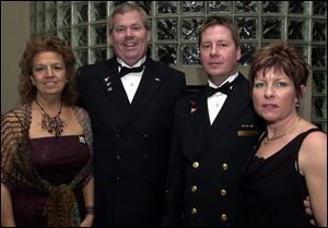CLUBBERS: Rita Hoff and husband Doug Hoff, commodore of the Sailing Club, and Tim Mikolajczak, commodore of the Maumee club, and wife Kathy are part of the event.