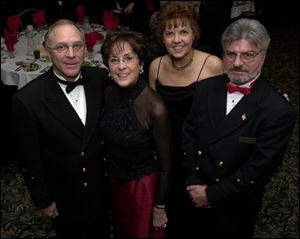 OFFICIALS: Commodore of the Toledo Yacht Club Jack Pozsik and wife Deborah and Commodore of Bay View Bill Lenz and wife Pauline enjoy the Port Winter Ball.