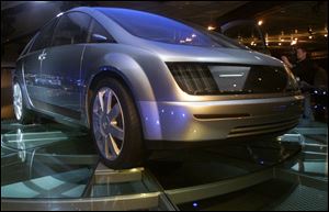 The Hy-Wire is a fuel-cell concept from GM, which is optimistic about the technology.