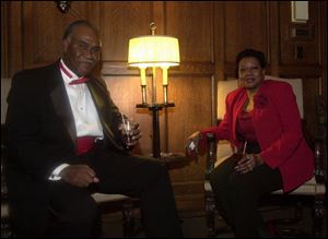 AFTER-CONCERT GUESTS: Ed and Lynn McNeal enjoy themselves in the ballroom of the Toledo Club at the ‘Lady in Red' dinner and dancing celebration after the opera.