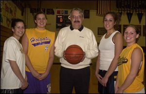 Holgate coach Bruce Schlosser has another 20-win season, thanks in large part to, from left, Alissa Gill, Jamie Thomas, Serena Urdiales and Vanessa Rothman.