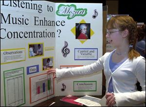 Bridget Brassell, 13, a student at St. Joseph's School in Maumee, explains how Mozart's music aids concentration.