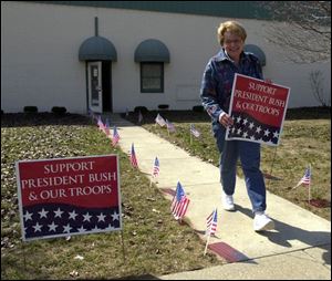 Molly Hauschild of Sylvania Township got one of 400 signs the local GOP is distributing.