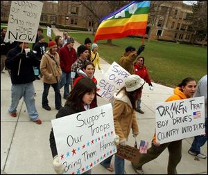 War protesters marching through Bowling Green State University were followed by a smaller pro-troop rally.