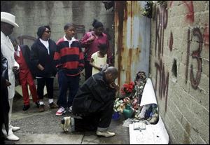 Prayers were offered April 15, 2001, where the teen was killed in Cincinnati's Over-the-Rhine district.